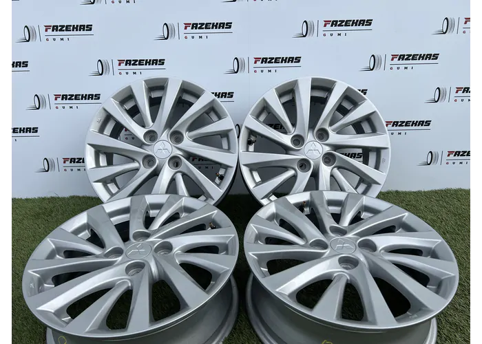 4x100 15" Mitsubishi Space Star gyári alufelni +TPMS szenzor 5,5Jx15h2 ET45 - Mobil Gumis