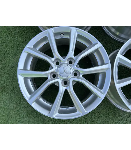5x114.3 16" Mitsubishi gyári alufelni +TPMS szenzor 6,5Jx16h2 ET46 2