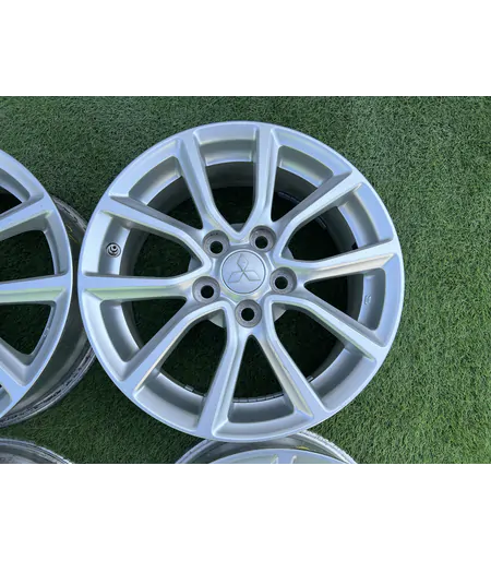 5x114.3 16" Mitsubishi gyári alufelni +TPMS szenzor 6,5Jx16h2 ET46 4