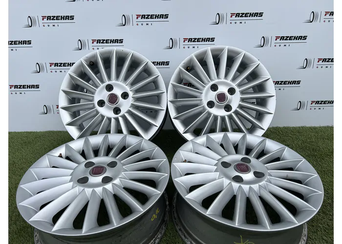 4x100 16" Fiat Grande Punto gyári alufelni 6Jx16h2 ET45 - Mobil Gumis