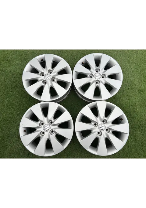 4x100 15" Suzuki gyári alufelni 5,5Jx15h2 ET50