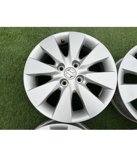 4x100 15" Suzuki gyári alufelni 5,5Jx15h2 ET50 5
