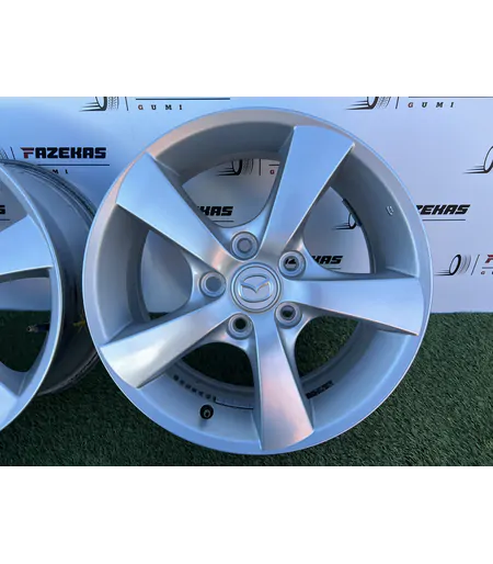 5x114.3 16" Mazda gyári alufelni 6,5Jx16h2 ET52,5 - Mobil Gumis 6
